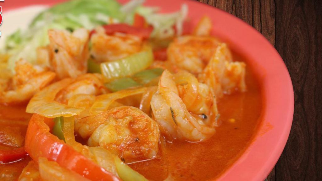 Camarones Rancheros · Shrimp grilled with onions, bell peppers, and ranchero sauce.