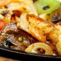Fajitas De Camaron · Shrimp mixed with red and green bell peppers, zucchini, yellow squash, corn, onions, rice an...
