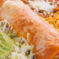 Enchilada Marina · 14-inch flour tortilla enchilada w/ shrimp or cheese topped with green or red sauce and melt...