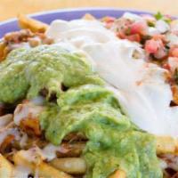 Carne Asada Fries · French fries with carne asada or your choice of meat with beans cheese sour cream guacamole ...