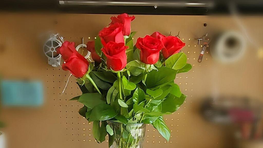Red Roses · Long stem red roses dozen