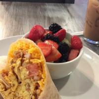 Turkey Sausage Breakfast Burrito · Scrambled eggs, Turkey sausage, Cheddar, potato and pico de gallo. Served with fresh tortill...