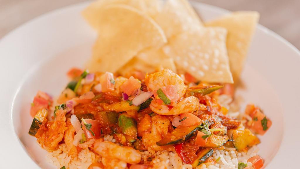 Grilled Shrimp Rice Bowl · grilled shrimp, fajita  veggies, rice served with pico de gallo and tortilla chips.