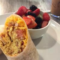 Breakfast Burrito · Scrambled eggs, turkey sausage, Cheddar, potato pico de gallo served with baby mixed greens.