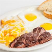 Steak And Eggs · Served with house potato and toast.