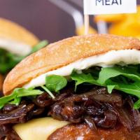 Beyond Meat™ Amandine Burger · Vegan patty. Beyond Meat™ patty, arugula, red onions, sauté mushrooms, cheddar, mayo - serve...