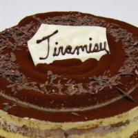 Tiramisu · Contains gelatin. Mascarpone, vanilla sponge, cocoa powder, coffee syrup, whipped cream.