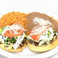 Sopes Plate · Two sopes served with beans and rice. Choose one or two meats. Sopes come with beans, lettuc...