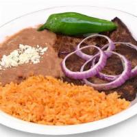 Asada Fillet Plate · Plate of asada fillet served with grilled onion and jalapeño. Plate comes with beans, rice, ...