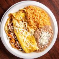 Ham Omelet · Ham omelet with cheese, onion, and bell peppers. Served with beans, rice, and choice of tort...