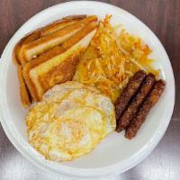 Sausages, Eggs & Hash Browns · Plate of three sausages, eggs, and hash browns.