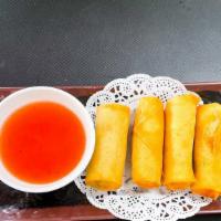 Crispy Egg Rolls (4) · Seasoned  vegetables wrapped in a crispy roll wrapper, served with sweet and sour sauce