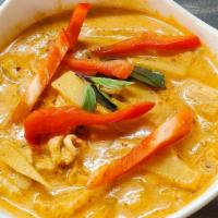 Red Curry · Spicy. Choice of meat in red coconut curry with bamboo shoots, and basil