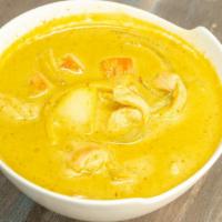 Yellow Curry · Spicy. Choice of meat in yellow coconut curry with potatoes, carrots, onions, and bell pepper