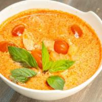 Pineapple Curry · Spicy. Choice of meat in red curry with pineapple