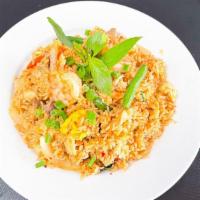 Amazing Asian Chili Paste Fried Rice · Spicy.  combination shrimp, chicken, beef, basil leaves, onion, green bean, chili paste with...