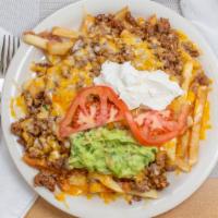 Asada Fries · Large order of french fries topped with beans, your choice of meat, melted cheese, sour crea...