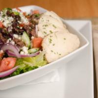 Chicken Greek Salad · Green leaf lettuce, tomatoes, red onions, olives, feta cheese, cucumbers, chicken breast wit...