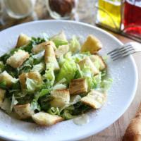 Caesar Salad · Freshly cut romaine lettuce and croutons dressed with Parmesan cheese and classic caesar dre...