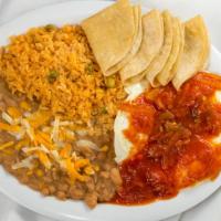 B11 Huevos Rancheros · Served With Rice, Beans, and Tortillas.