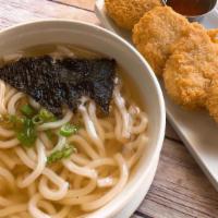 Udon Noodle Soup With Shrimp Tempura · Udon noodle in soy based broth served with shrimp tempura.