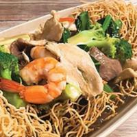 Combination Crispy Noodles · Crispy egg noodle topped with chicken, beef, shrimp, broccoli, carrots and Chinese broccoli ...