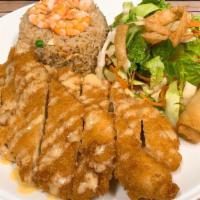 House Lemon Chicken · Battered chicken topped with sweet lemon served with shrimp fried rice, green salad and vege...