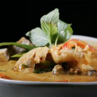 Red Curry · Choice of meat mixed with rich red curry paste, coconut milk, bell peppers, green beans, egg...