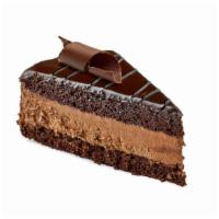 Chocolate Mousse · A rich chocolate mousse topped with chocolate curls.