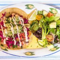 Fish Tacos · Gluten free. Fried wild fish, shredded cabbage, guacamole, pico, chipotle crema and aranda's...