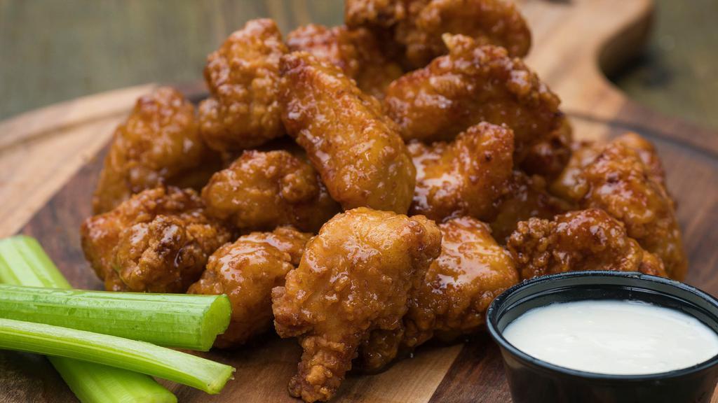 48 Boneless Wings · Served with 48 Boneless Wings. Choose up to 2 flavors. Cooked to order. Comes with celery and your choice of Ranch or Blue Cheese dressing.