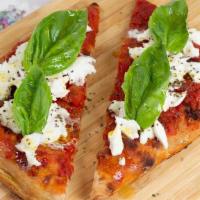 Margherita Slice · Fresh buffalo mozzarella and tomato sauce