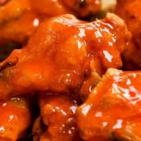 New York Cheese Pizza And Buffalo'S Buffalo Wings · Large slice of original New York Cheese pizza 8 mild sauce buffalo wings and french fries