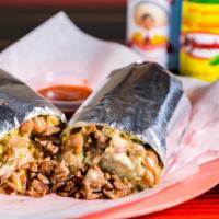 Super · Meat, rice, beans, salsa, sour cream, guacamole, and cheese.