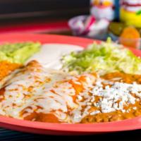 Enchiladas Rojas · Meat or cheese topped with red or green enchilada sauce and melted cheese served with rice, ...