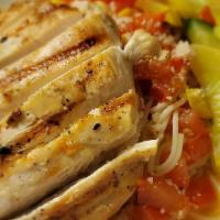 Chicken Pomodoro · Grilled sliced chicken breast, fresh Roma tomatoes, garlic, basil, served over angel hair pa...