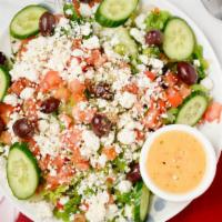 Greek Salad · Lettuce, tomatoes, cucumbers, bell peppers, onions, kalamata olives, feta cheese, and oregan...