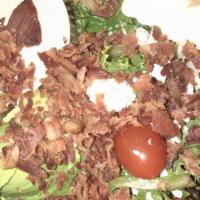 Cobb Salad · Turkey, bacon, eggs, tomatoes, avocado, bleu cheese crumbles, green onions, and olives with ...