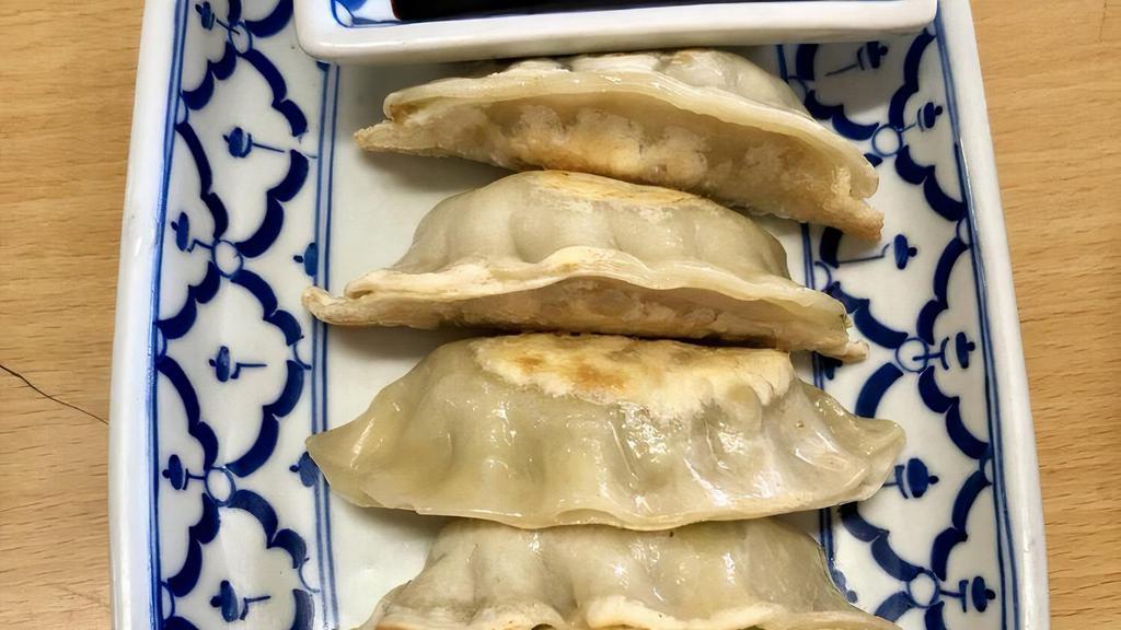Pot Stickers · Ground chicken and vegetable wrapped with pot sticker wrapper.
