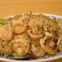 Pad Thai Prawns Or Seafood · Pan-fried small rice noodle choice of prawns or seafood, bean sprouts, egg, onion, and roast...
