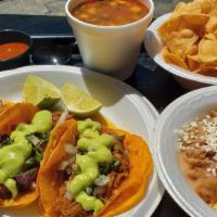 Birria De Res Taco Plate · Three Angus Beef stew tacos served on a corn tortilla with melted cheese, top with onions,  ...
