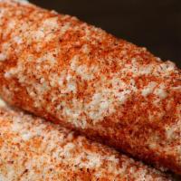 Corn On The Cob · Mexican Style Street sweet Corn. top with mayo, butter, cotija Queso and  Mexican Chili powd...