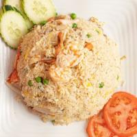 Combination Fried Rice · Combination of shrimp, chicken, pork, beef, eggs, peas, and carrots.