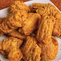 Wings (12) · Twelve breaded and fried chicken wings with your choice of sauce.