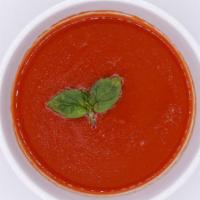 Tomato Basil Bisque · A delicious and comforting soup with tangy tomato, fresh basil, and just a hint of cream