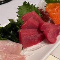 Three Kinds Of Assorted Sashimi · Tuna, Yellowtail, Salmon.