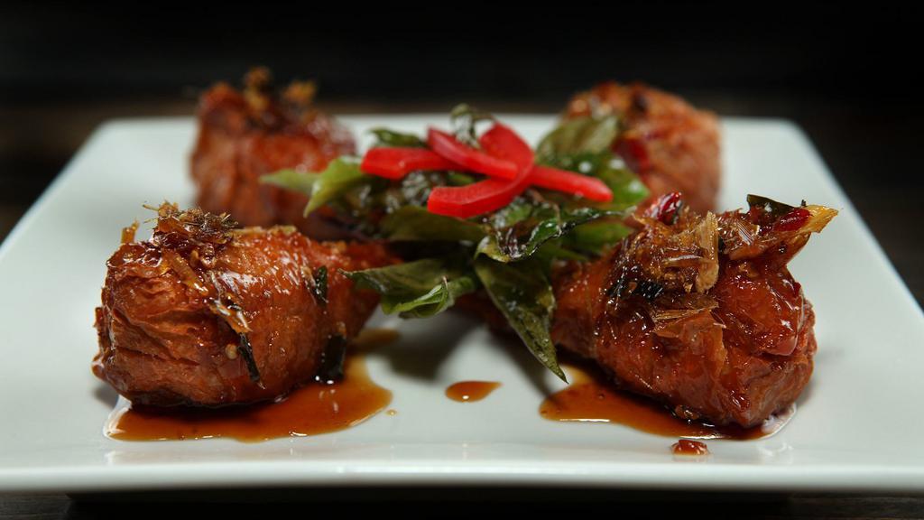 Muay Thai Wing Kicks · Favorite. Spicy, gluten free. Thailand's famous hot wings: soy chicken wings cooked in traditional lemongrass sauce, topped with crispy basil.