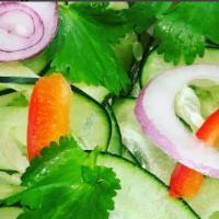 Cucumber Salad · Gluten free. Cucumber, red onions, red bell peppers in sweet apple cider vinegar.