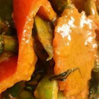Panang Curry · Spicy, gluten free. Medium spicy panang curry paste, coconut milk, carrots, bell peppers, ba...