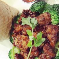 Kai Ga-Tiam · Favorite. Gluten free. Authentic Thai style soy chicken cooked with special garlic sauce and...
